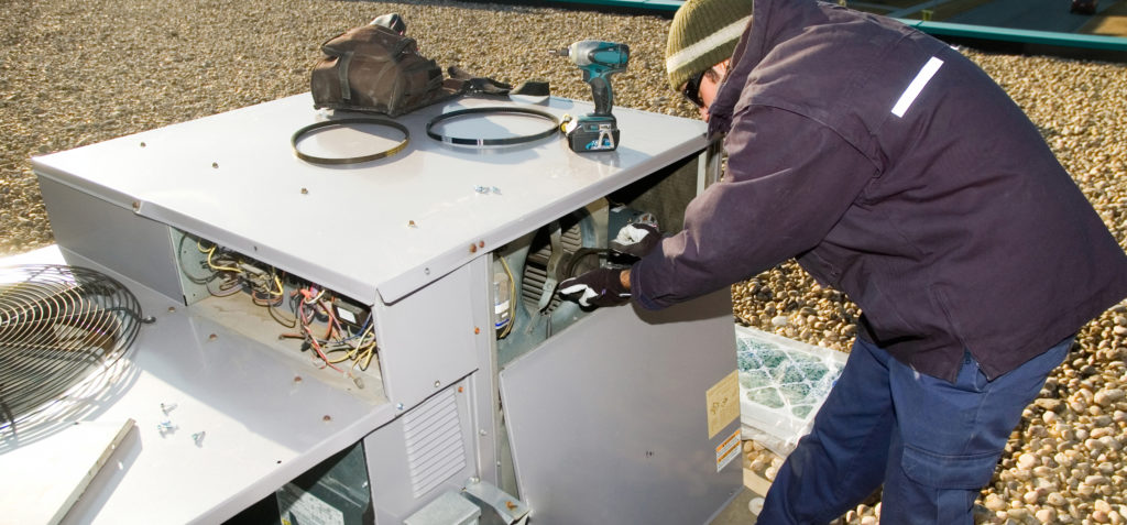 Inspecting Roof Top Unit